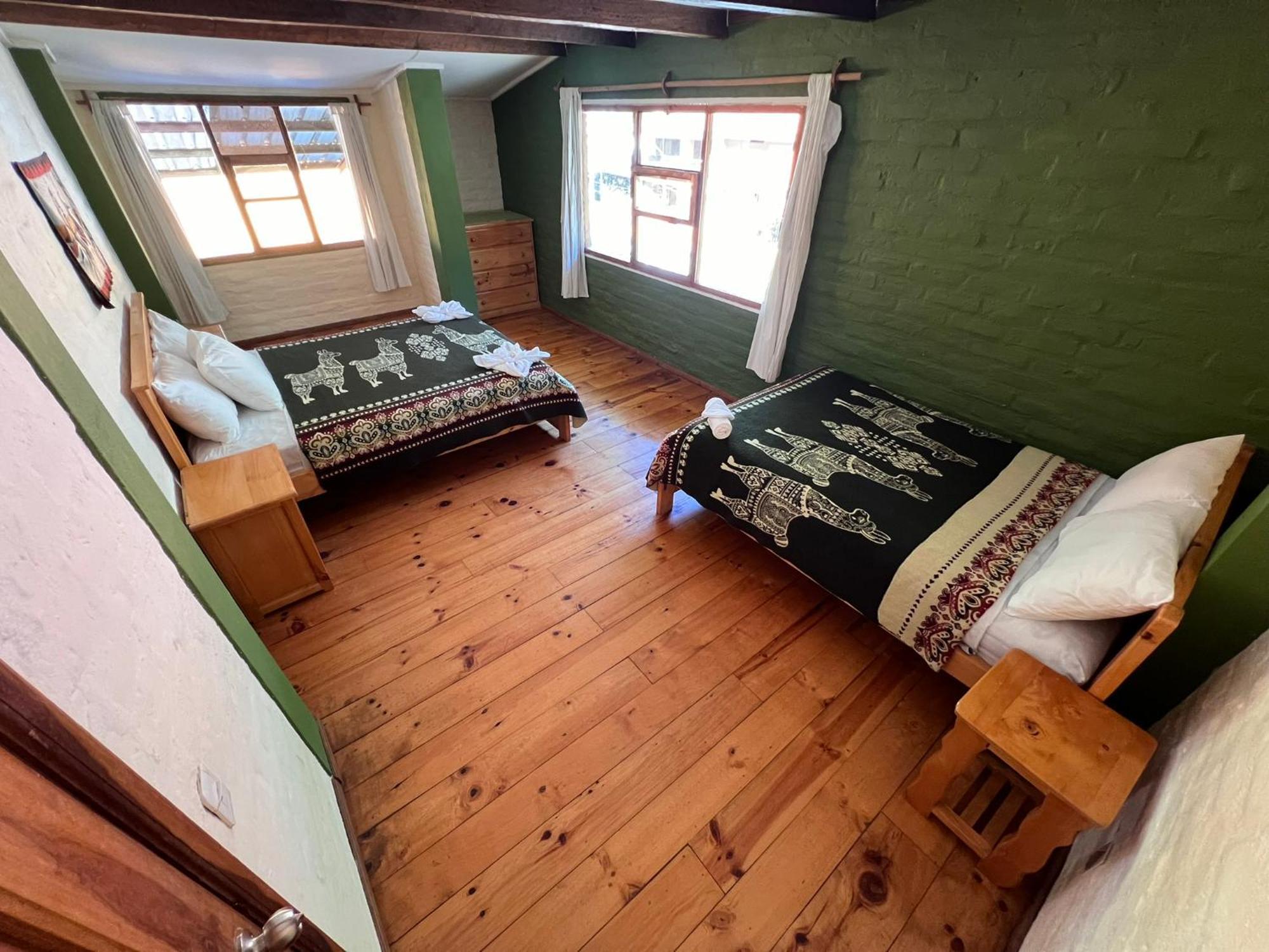 La Casa Verde Eco Guest House Baños Quarto foto